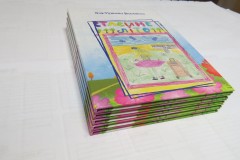 Печать детской книги в твердом переплете.